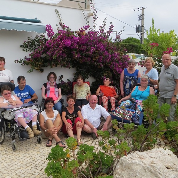 group holiday picture with wheelchair users in lagos villas enable holidays portugal algarve